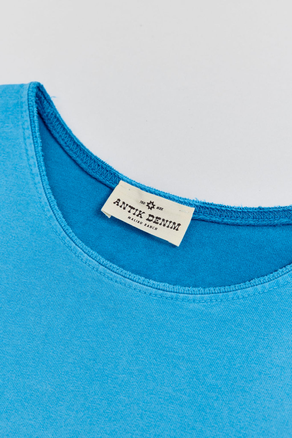 AM9100W TURQUOISE T-SHIRT