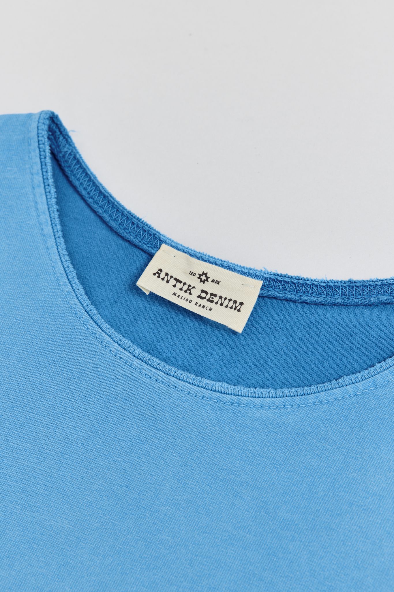 AM9100W TURQUOISE T-SHIRT